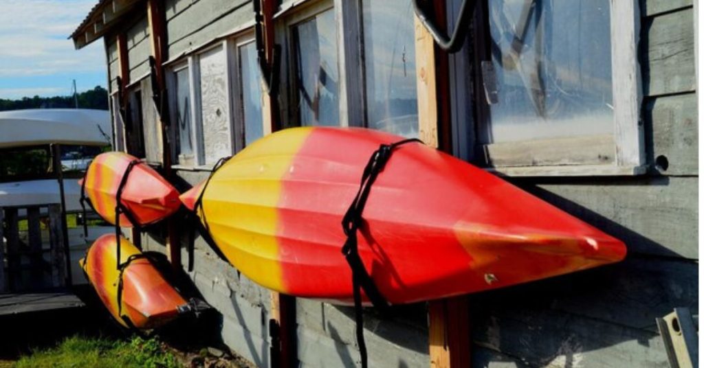 how to hang kayaks in a garage
